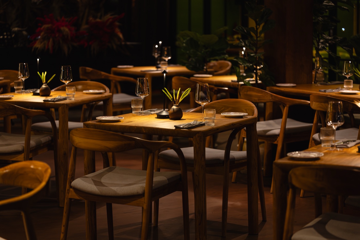 ETNA candlelit dining tables at night