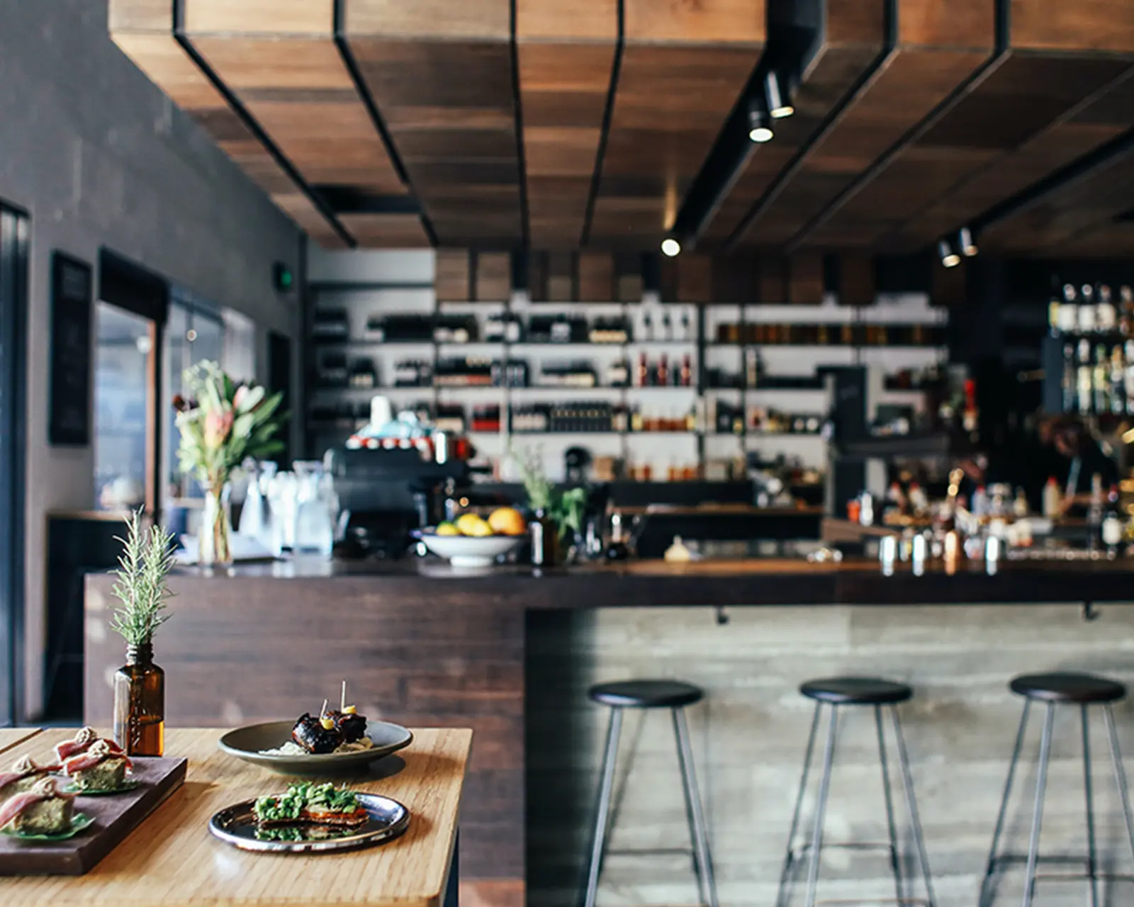 Premium restaurant interior visual reference for a hospitality website